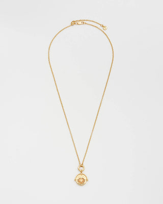Tweelingen Sterrenbeeldketting van Fable England - detail van de gouden munt en spinner